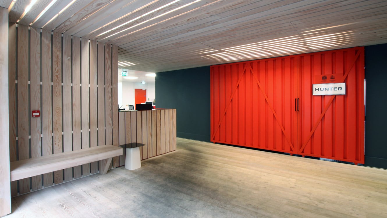 Red barn style doors reinforce the rural theme